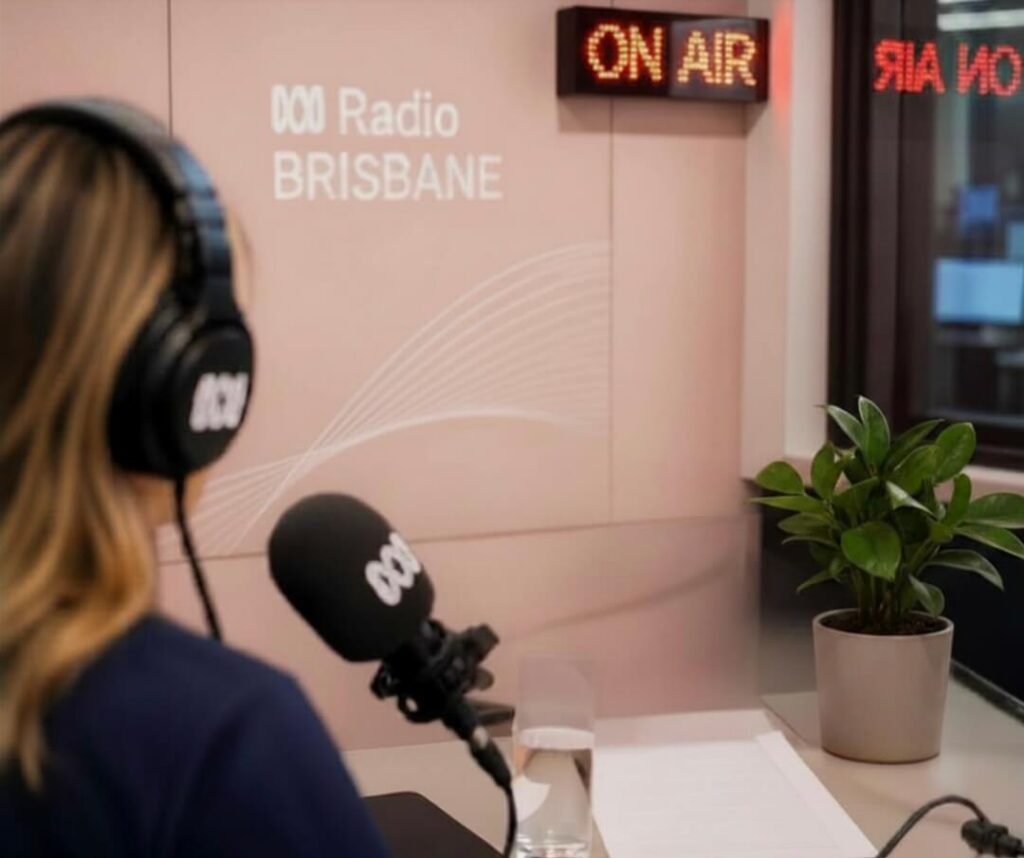 A radio host speaking on air at 000 Radio Brisbane.