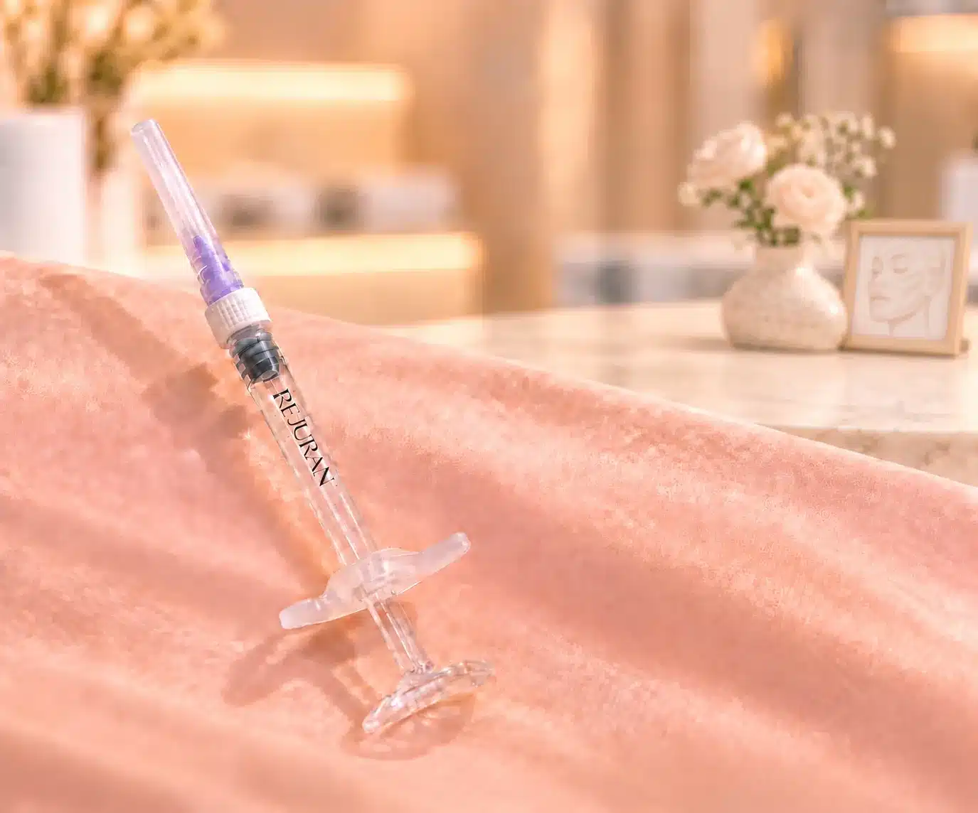 Rejuran syringe on a towel